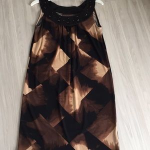 Multi colored dress with a round neck border